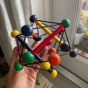 Manhattan Toy Skwish Color Burst Rattle and Teether Grasping Activity Toy